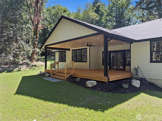 821 174th Ave NW, Lakebay, WA 98349 - view of front of property featuring a ceiling fan, a front yard, a shingled roof, and a deck
