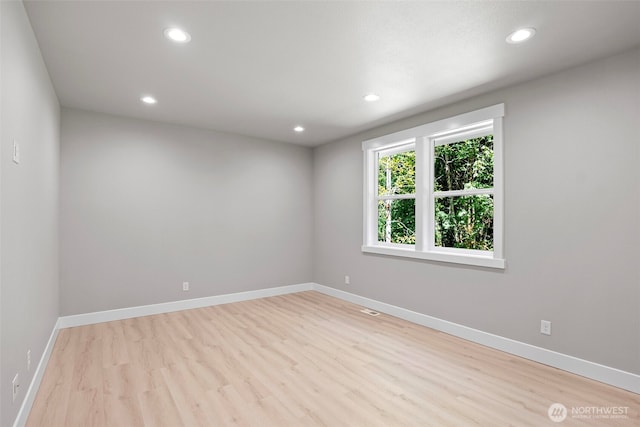 821 174th Ave NW, Lakebay, WA 98349 - unfurnished room featuring wood finished floors and recessed lighting