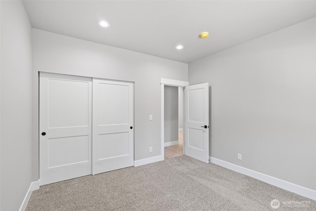 821 174th Ave NW, Lakebay, WA 98349 - unfurnished bedroom with carpet, recessed lighting, and a closet