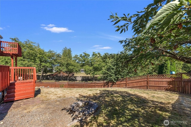 8618 217th Pl NE, Arlington, WA 98223 - fenced backyard with a wooden deck