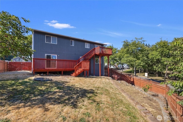 8618 217th Pl NE, Arlington, WA 98223 - back of house with a deck, stairs, and a fenced backyard