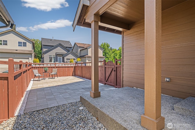 4318 3rd Ave NW, Olympia, WA 98502 - view of patio / terrace featuring a gate and a residential view