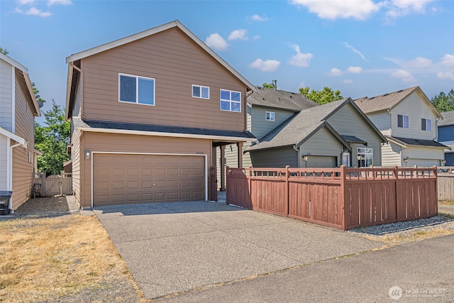 4318 3rd Ave NW, Olympia, WA 98502 - traditional-style home featuring a garage and driveway