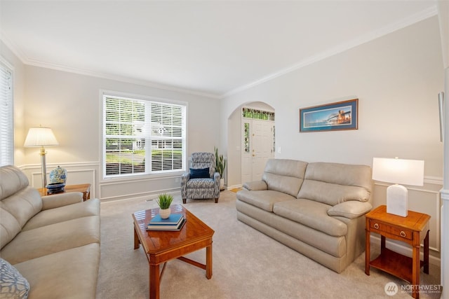 1402 Langara Cir, Bellingham, WA 98229 - living area featuring arched walkways, carpet, and crown molding
