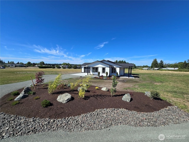 71 Falconcrest Ct, Sequim, WA 98382 - view of front of house with a front lawn, concrete driveway, and an attached garage