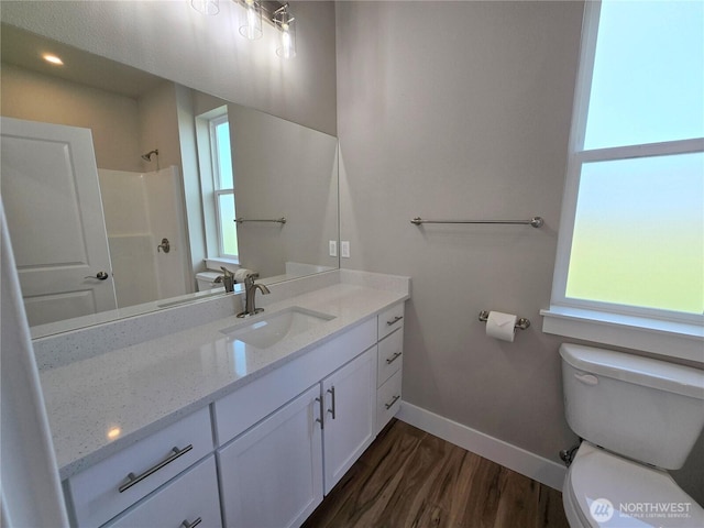 71 Falconcrest Ct, Sequim, WA 98382 - full bathroom featuring vanity, a shower, and wood finished floors