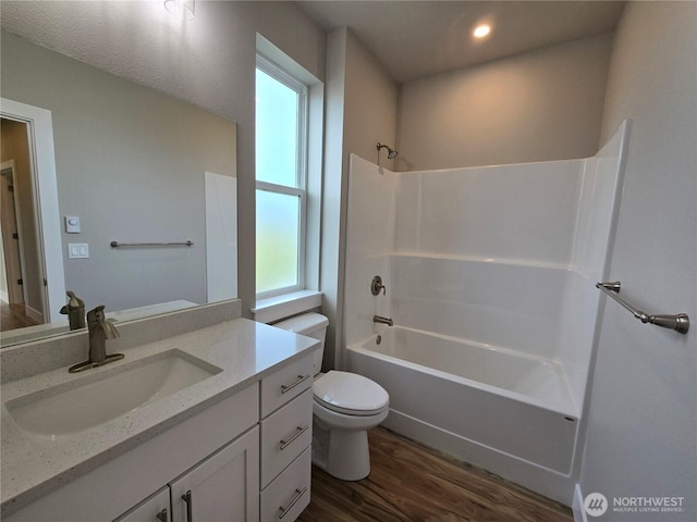 71 Falconcrest Ct, Sequim, WA 98382 - full bath featuring wood finished floors, vanity, bathtub / shower combination, and recessed lighting