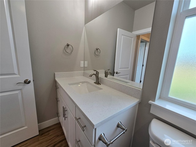 71 Falconcrest Ct, Sequim, WA 98382 - half bathroom with vanity and wood finished floors