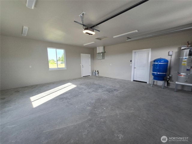 71 Falconcrest Ct, Sequim, WA 98382 - garage with secured water heater and a garage door opener
