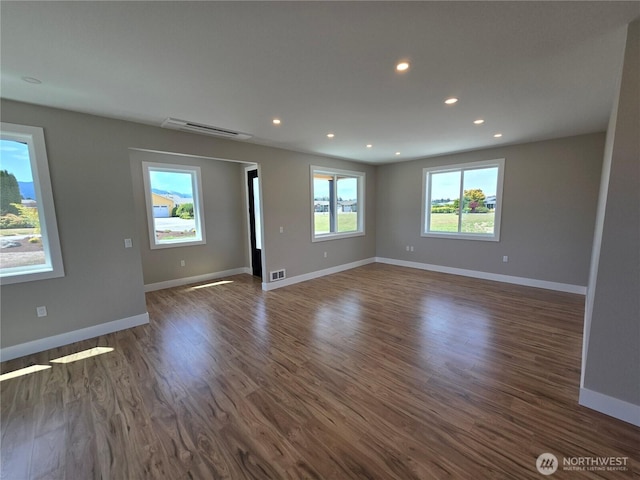 71 Falconcrest Ct, Sequim, WA 98382 - unfurnished room featuring recessed lighting and dark wood-style flooring