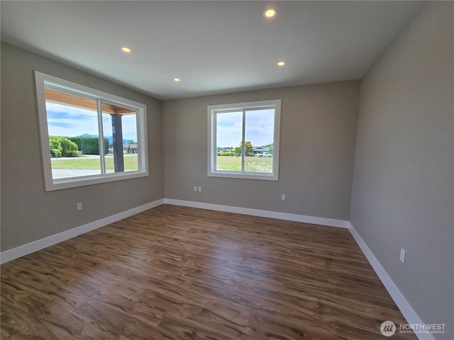 71 Falconcrest Ct, Sequim, WA 98382 - empty room with recessed lighting and dark wood finished floors