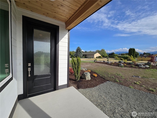 71 Falconcrest Ct, Sequim, WA 98382 - doorway to property featuring a patio area
