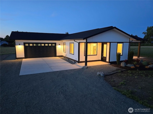71 Falconcrest Ct, Sequim, WA 98382 - view of front of house with concrete driveway and an attached garage