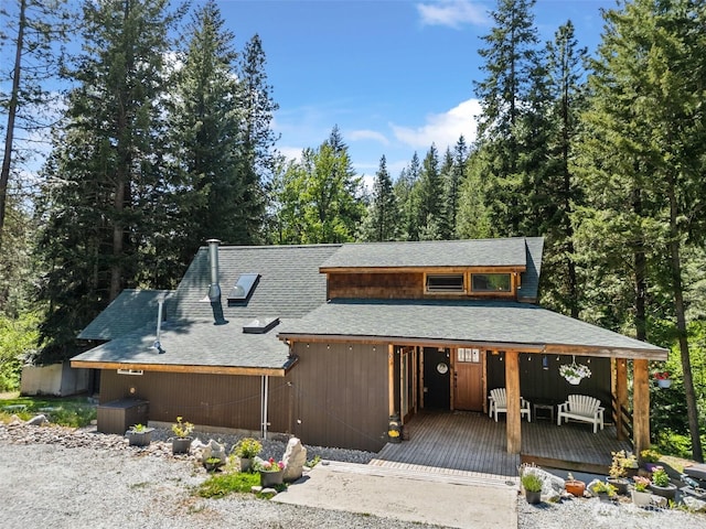 16845 Second Creek Rd, Leavenworth, WA 98826 - chalet / cabin with a shingled roof and covered porch