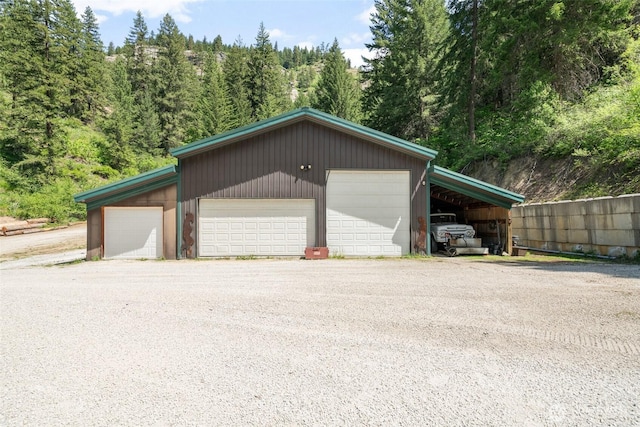 16845 Second Creek Rd, Leavenworth, WA 98826 - garage with a garage and a view of trees