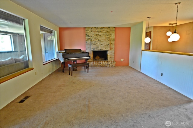 113 19th Ave SE, Puyallup, WA 98372 - living area featuring carpet floors and a fireplace