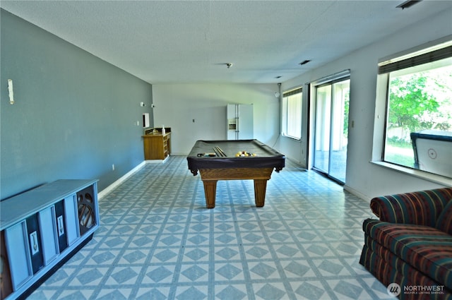 113 19th Ave SE, Puyallup, WA 98372 - game room with light flooring, billiards, and a textured ceiling