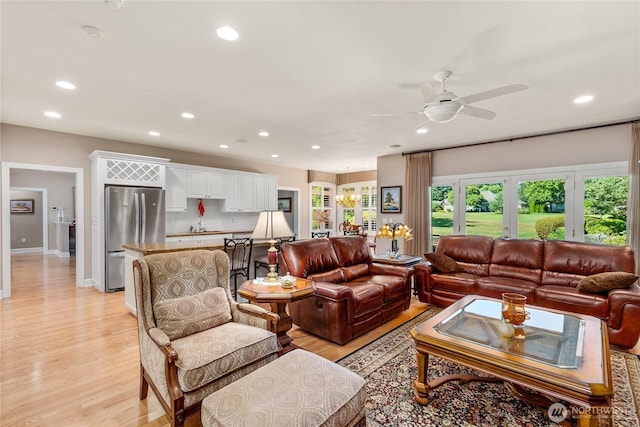 3912 Prestwick Ln SE, Olympia, WA 98501 - living room with recessed lighting, ceiling fan, and light wood-type flooring
