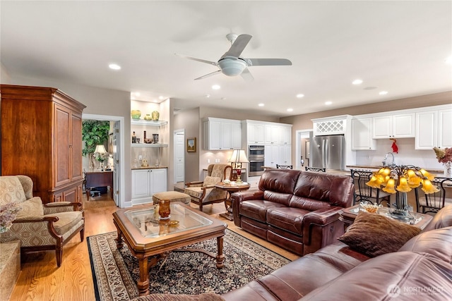 3912 Prestwick Ln SE, Olympia, WA 98501 - living room featuring light wood finished floors, ceiling fan, and recessed lighting