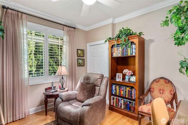 3912 Prestwick Ln SE, Olympia, WA 98501 - living area with light wood-style floors, ornamental molding, and ceiling fan