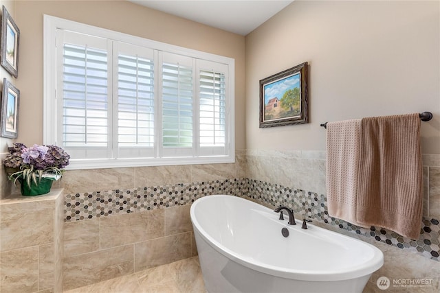 3912 Prestwick Ln SE, Olympia, WA 98501 - bathroom with a freestanding bath and tile walls