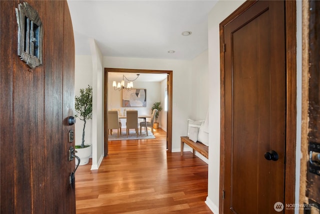 118 NW 132nd St, Seattle, WA 98177 - hallway with a chandelier, light wood-style flooring, and recessed lighting