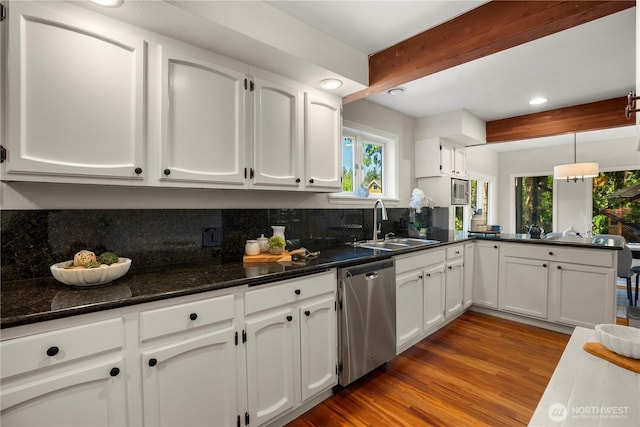 118 NW 132nd St, Seattle, WA 98177 - kitchen with stainless steel dishwasher, beamed ceiling, white cabinets, backsplash, and a peninsula