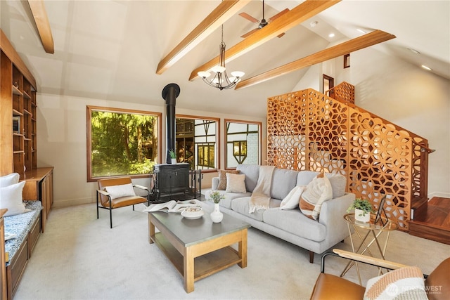 118 NW 132nd St, Seattle, WA 98177 - carpeted living area featuring a wood stove, beam ceiling, ceiling fan, high vaulted ceiling, and recessed lighting