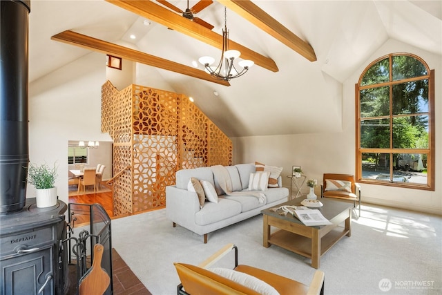 118 NW 132nd St, Seattle, WA 98177 - living area featuring a chandelier, beamed ceiling, carpet flooring, a wood stove, and recessed lighting