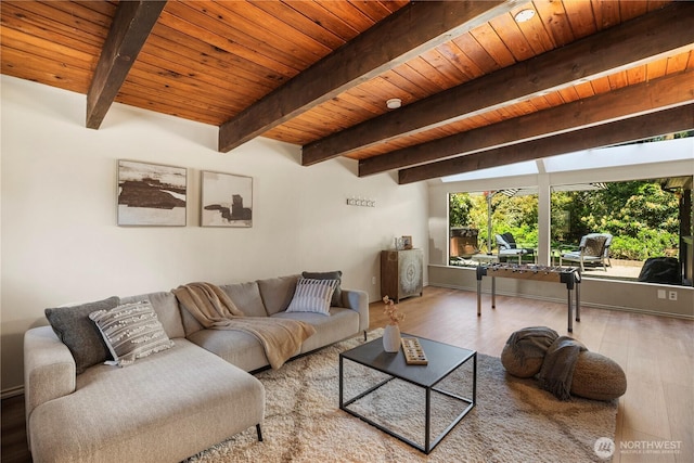 118 NW 132nd St, Seattle, WA 98177 - living area with healthy amount of natural light, a wood ceiling with exposed beams, and wood finished floors