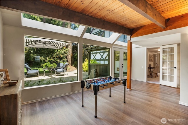 118 NW 132nd St, Seattle, WA 98177 - game room featuring french doors, a wooden ceiling with exposed beams, wood finished floors, and a skylight