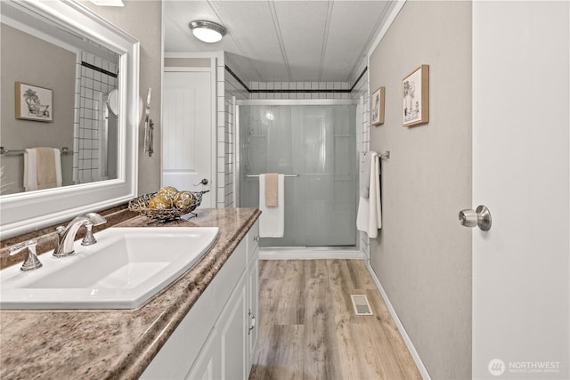 27114 320th Ave SE, Ravensdale, WA 98051 - bathroom with vanity, wood finished floors, and a shower stall