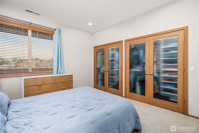 2401 Skyline Way Unit 203E, Anacortes, WA 98221 - carpeted bedroom featuring french doors and recessed lighting