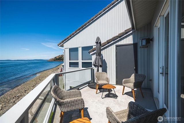 2401 Skyline Way Unit 203E, Anacortes, WA 98221 - balcony featuring view of water and beach