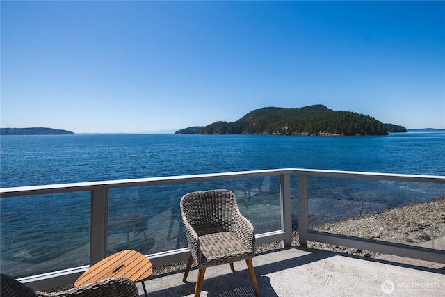 2401 Skyline Way Unit 203E, Anacortes, WA 98221 - balcony featuring a water and mountain view