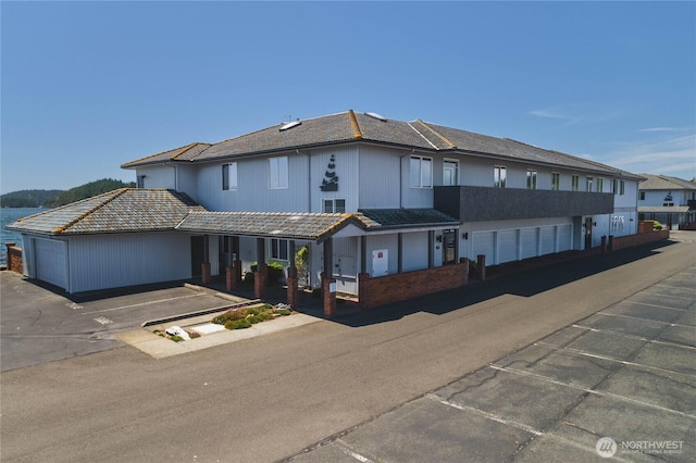 2401 Skyline Way Unit 203E, Anacortes, WA 98221 - view of front of property featuring uncovered parking