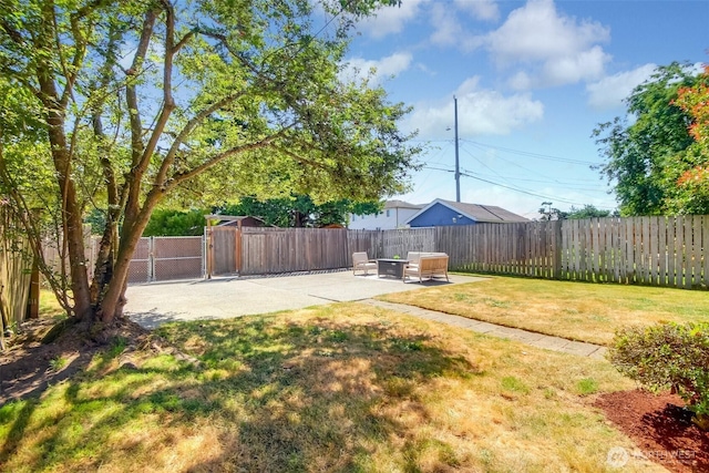 5618 35th Ave SW, Seattle, WA 98126 - view of yard with a patio area and a gate