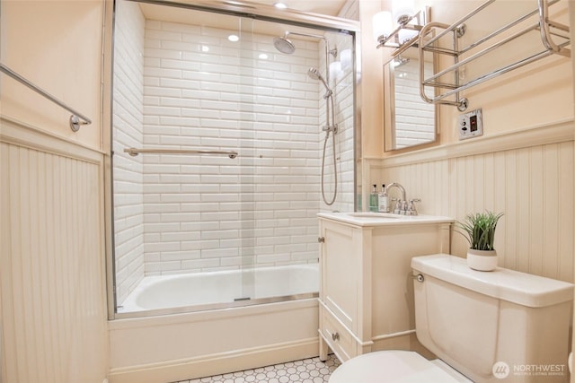 5618 35th Ave SW, Seattle, WA 98126 - full bath featuring shower / bath combination with glass door, vanity, and a wainscoted wall