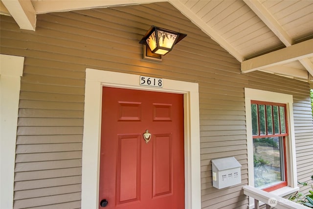5618 35th Ave SW, Seattle, WA 98126 - doorway to property featuring covered porch