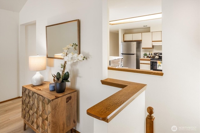 9004 20th Ave NE, Seattle, WA 98115 - hall featuring light wood-type flooring and baseboards