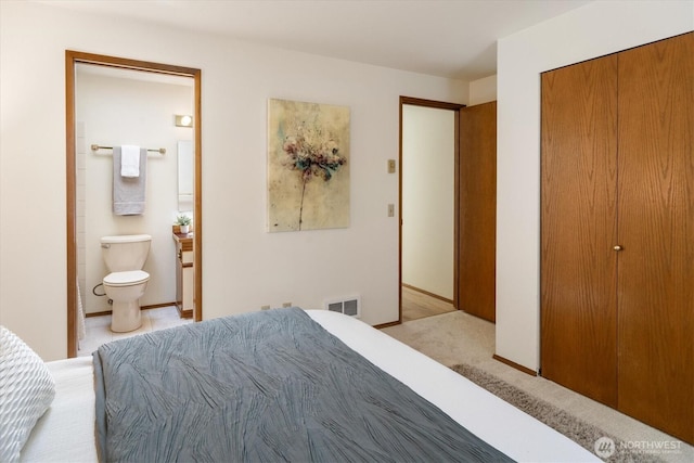 9004 20th Ave NE, Seattle, WA 98115 - bedroom with ensuite bath and a closet