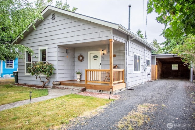 606 State St, Centralia, WA 98531 - view of front of house featuring gravel driveway and covered porch