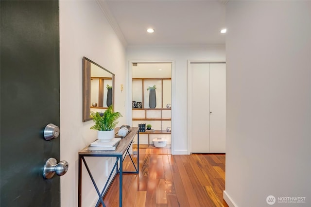 201 E Boston St Unit 2100, Seattle, WA 98102 - hallway with wood finished floors, ornamental molding, and recessed lighting