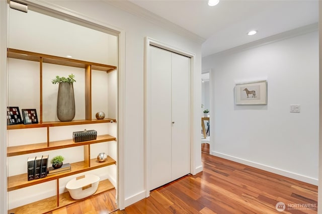 201 E Boston St Unit 2100, Seattle, WA 98102 - hall featuring wood finished floors, recessed lighting, and ornamental molding