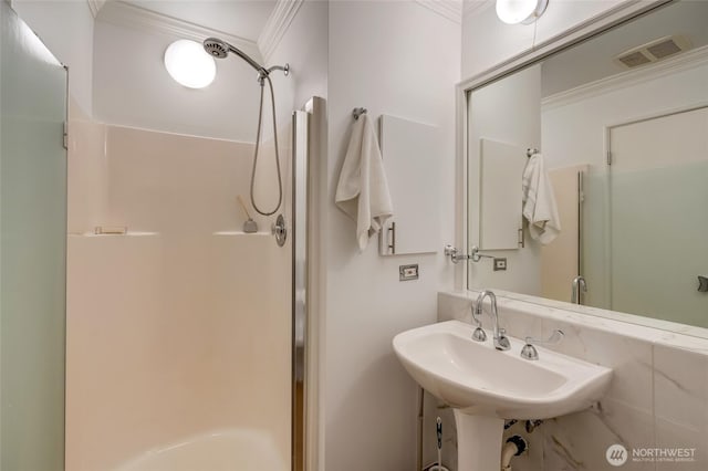 201 E Boston St Unit 2100, Seattle, WA 98102 - bathroom with a shower stall and ornamental molding
