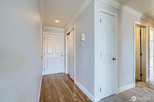 2514 57th Ave SW Unit 301, Seattle, WA 98116 - corridor with crown molding, recessed lighting, and wood finished floors