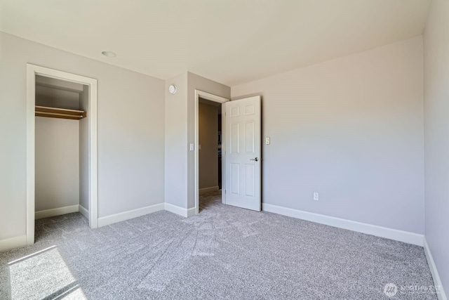 2514 57th Ave SW Unit 301, Seattle, WA 98116 - unfurnished bedroom featuring carpet and a closet