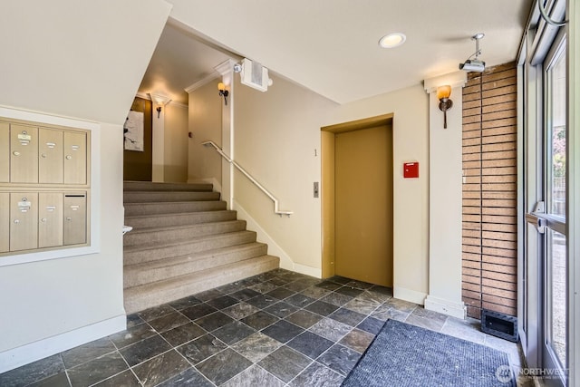2514 57th Ave SW Unit 301, Seattle, WA 98116 - stairway with stone tile flooring, elevator, healthy amount of natural light, recessed lighting, and mail area
