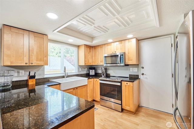 2003 SW 307th St Unit B, Federal Way, WA 98023 - kitchen featuring stainless steel appliances, light brown cabinets, light wood finished floors, and recessed lighting