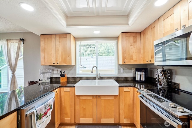 2003 SW 307th St Unit B, Federal Way, WA 98023 - kitchen featuring appliances with stainless steel finishes, crown molding, dark stone counters, recessed lighting, and light brown cabinets